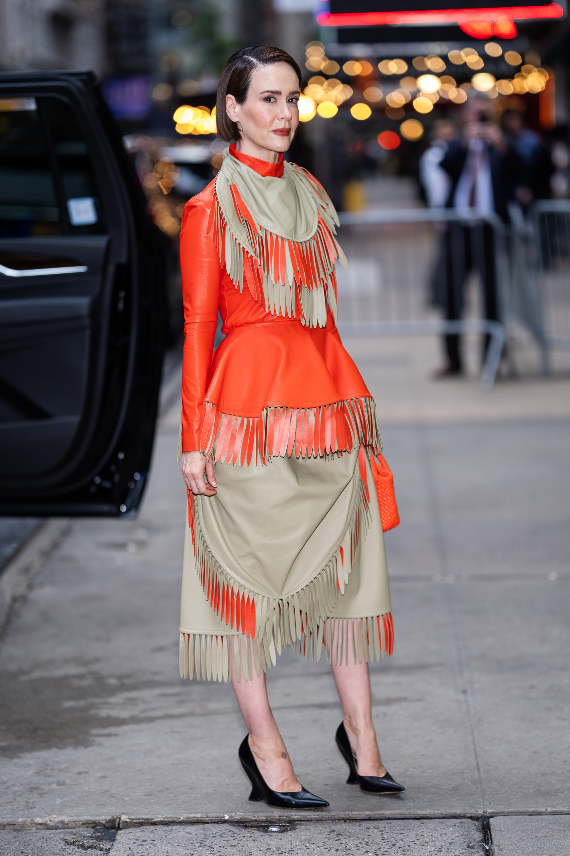 Sarah Paulson wears wedges with a colorful skirt set in NYC