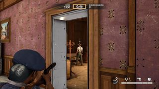 Taking aim with a silenced pistol through a doorway as a Resistance member in Sniper Elite: Resistance