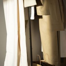 Clothes hanging on a rail