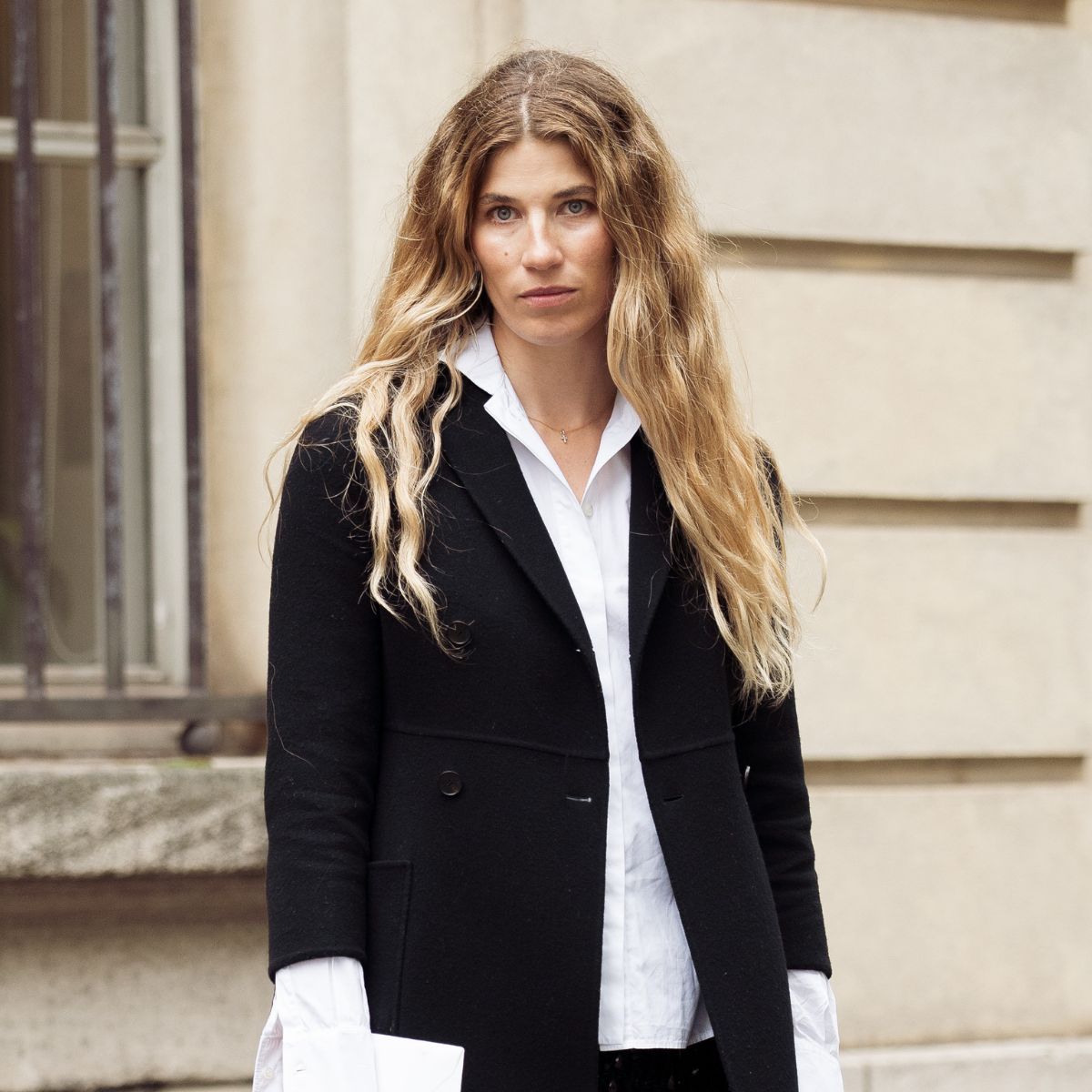 veronika heilbrunner showing off her wavy hair on the streets of paris