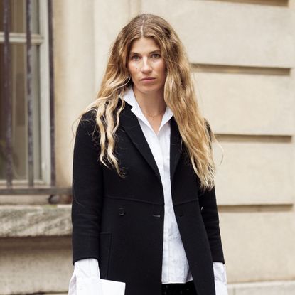 veronika heilbrunner showing off her wavy hair on the streets of paris