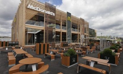 The newly constructed McDonald's at Olympic Park in East London features 20 cashier lines and is expected to serve 14,000 diners a day.