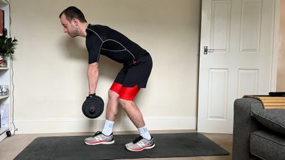 James Frew performing a split leg deadlift