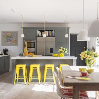 kitchen with worktop and bar stools