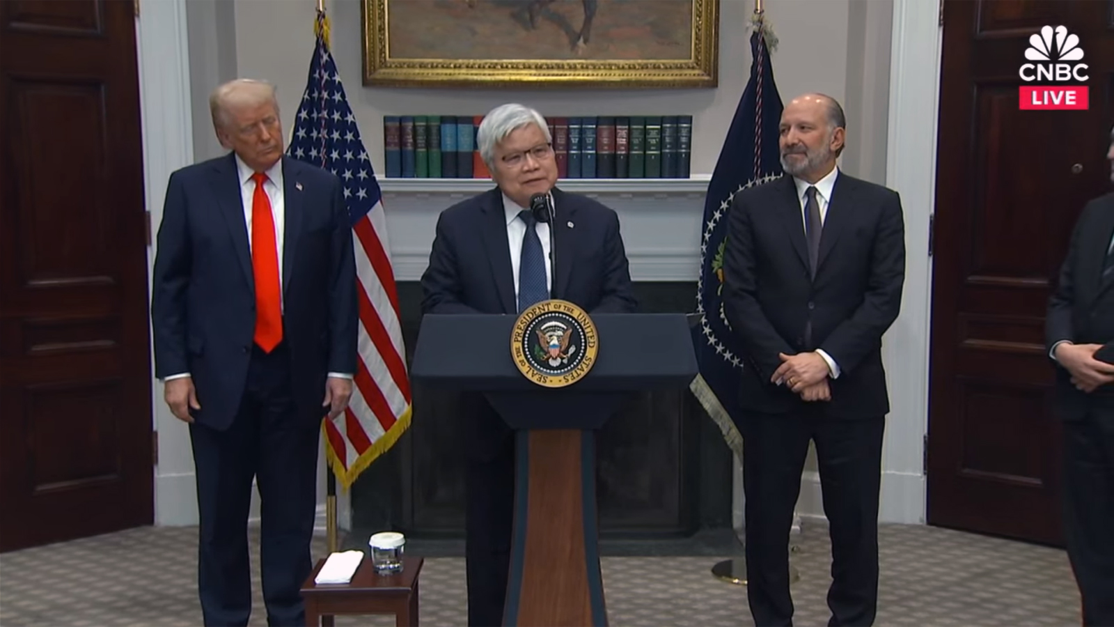 CC Wei speaking on the podium with President Trump and Sec Lutnick