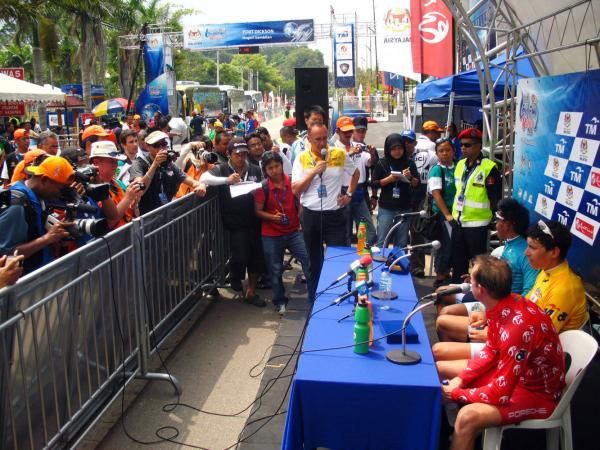 Jean-Francois Quenet carries out translation duties at the post-stage press conference