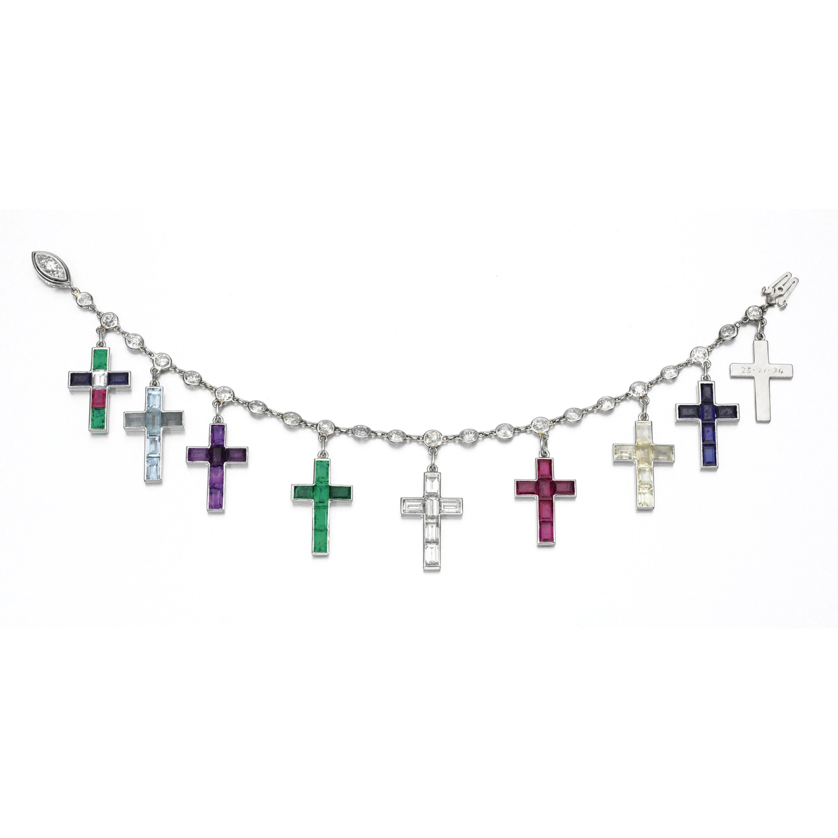 Silver chain bracelet with multiple cross pendants hanging off it