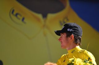 Geraint Thomas collecting another yellow jersey