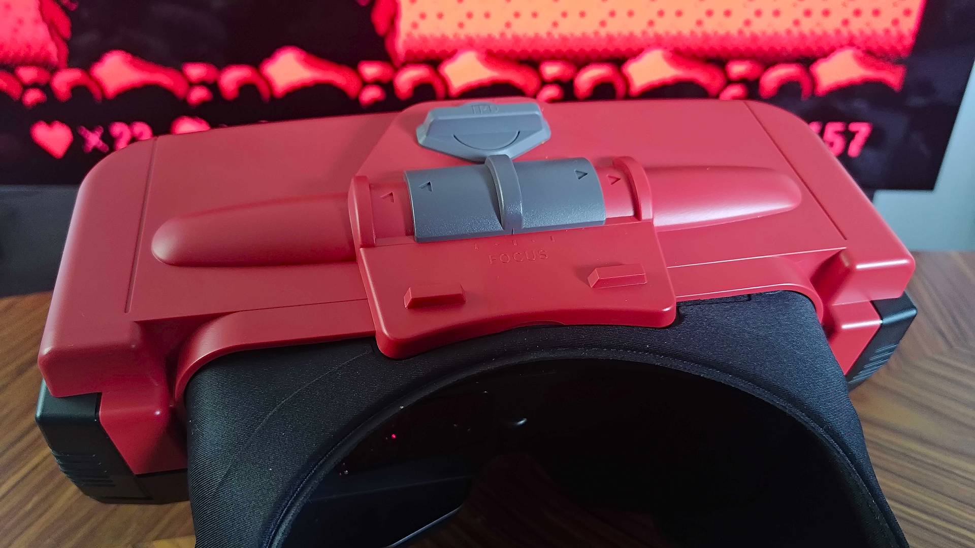 Close up of Virtual Boy for Switch notch for opening top compartment.