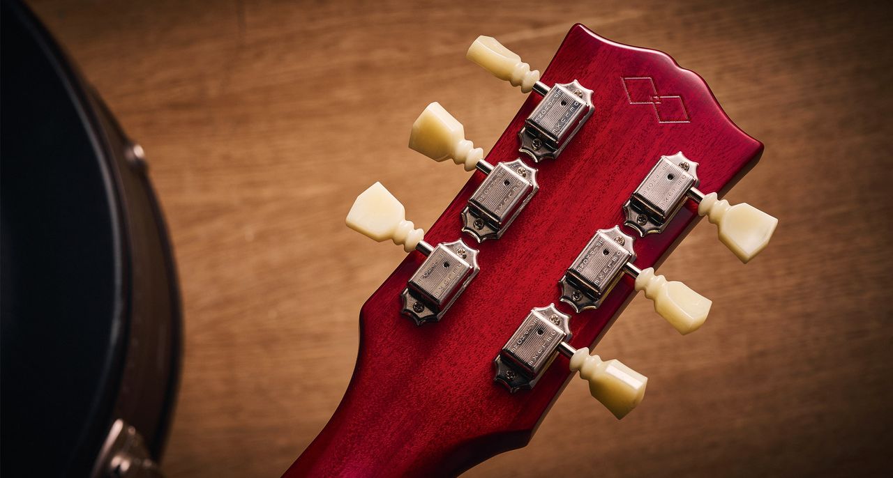 Epiphone Inspired By Gibson Custom 1962 ES-335 Reissue: the handsome semi-hollow electric is finished in Sixties Cherry and is photographed against various backgrounds.
