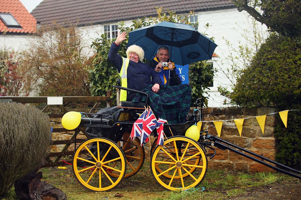 Fans await the peloton on stage three of the 2016 Tour de Yorkshire from Middlesbrough to Scarborough