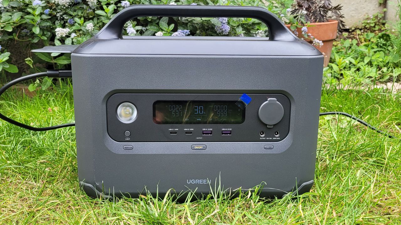 Ugreen PowerRoam 1200 Power Station outside on grass