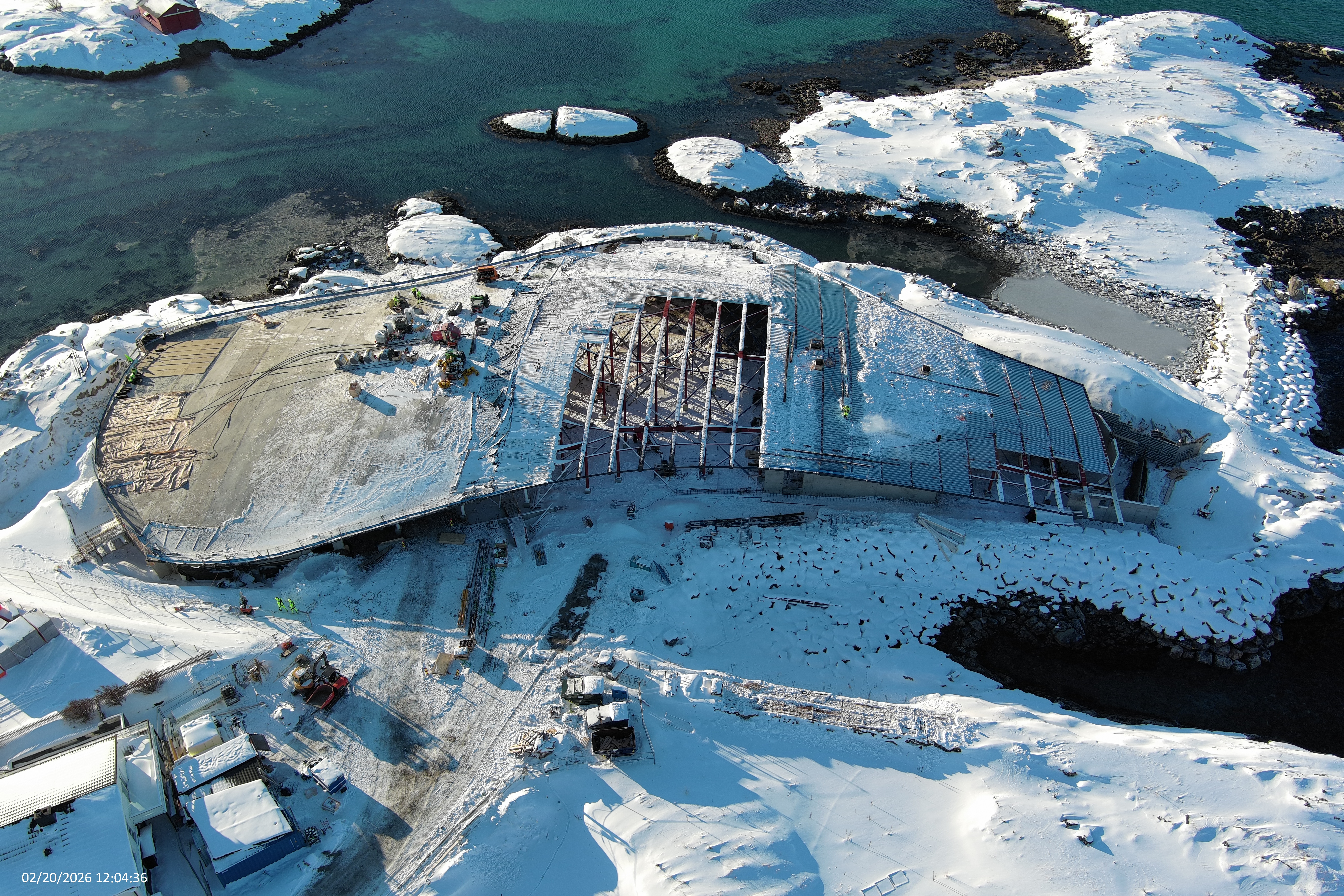 photo of the building site of The Whale by Dorte Mandrup in the Norwegian coast line among snow