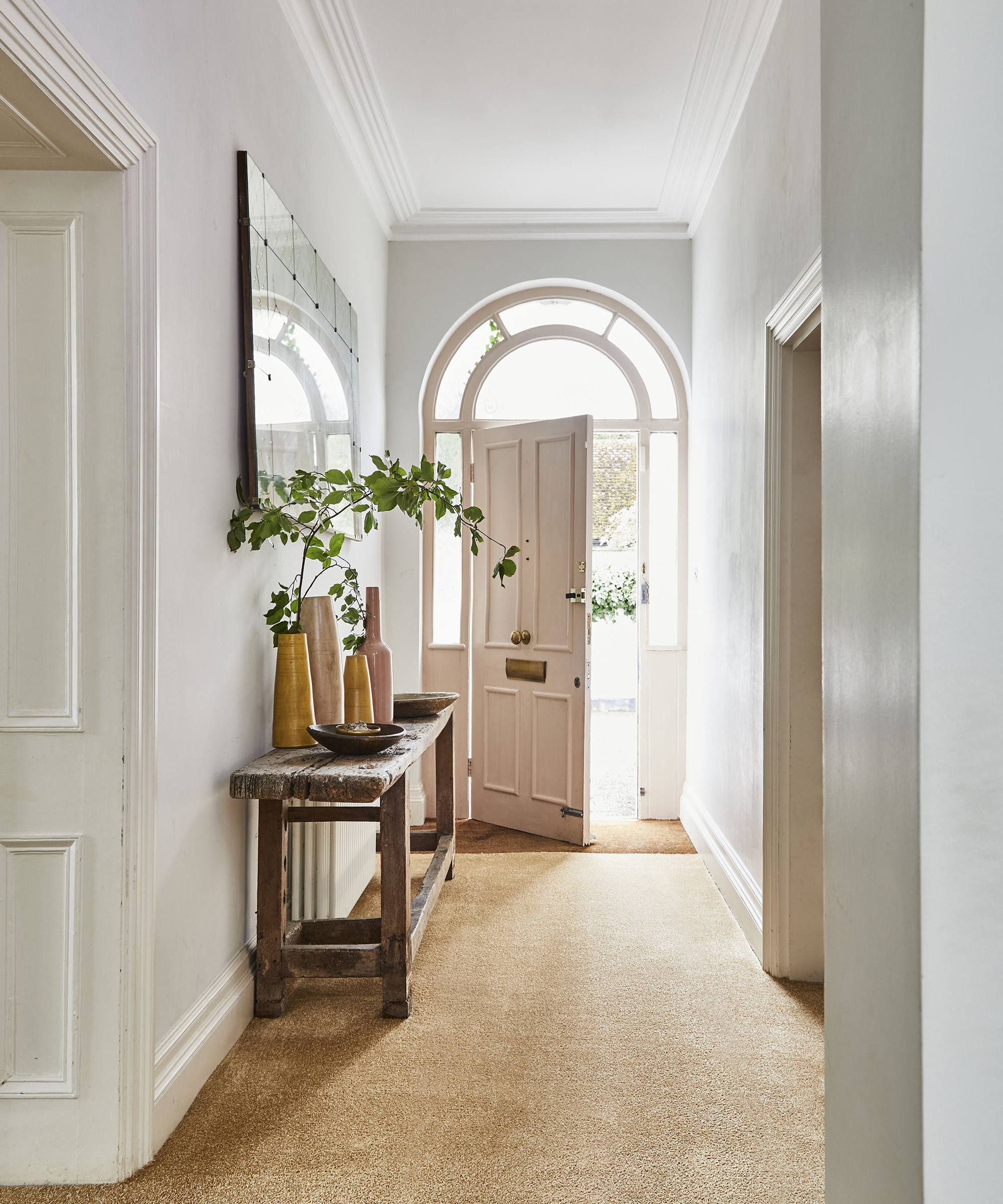 Hallway ideas by Carpetright with pink door decor and beige colored Kingston Citrine Carpet at £9.99 per meter squared