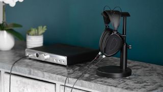 Dan Clark Audio Noire XO wired headphones in black on a stand