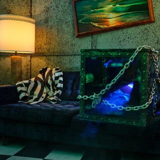 Beetlejuice living room with chained box and Beetlejuice striped jacket