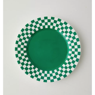 green dinner plate with a checkered border