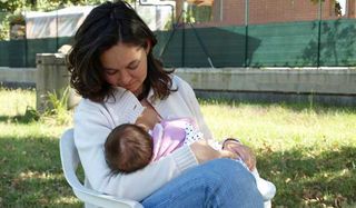 mom breastfeeding baby