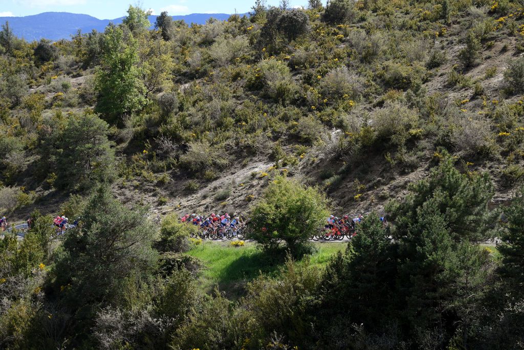 JACA SPAIN MAY 02 A general view of the peloton passing through a landscape during the 10th La Vuelta Femenina 2024 Stage 5 a 1139km stage from Huesca to Alto del Fuerte Rapitan Jaca 1103m UCIWWT on May 02 2024 in Jaca Spain Photo by Alex BroadwayGetty Images