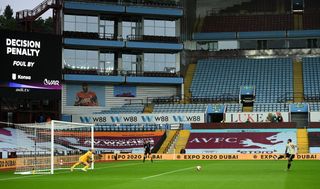 Manchester United's Bruno Fernandes scores a penalty against Aston Villa after a VAR check