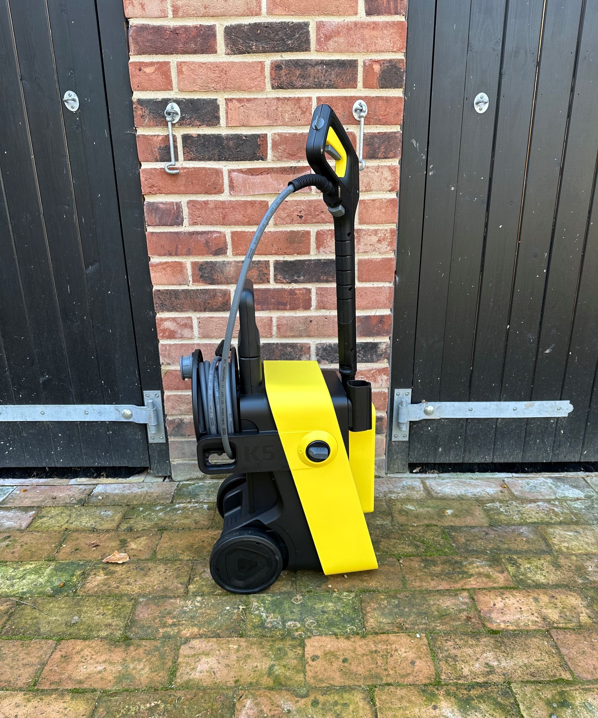 A yellow Karcher K5 comfort premium pressure washer after unboxing and assembling
