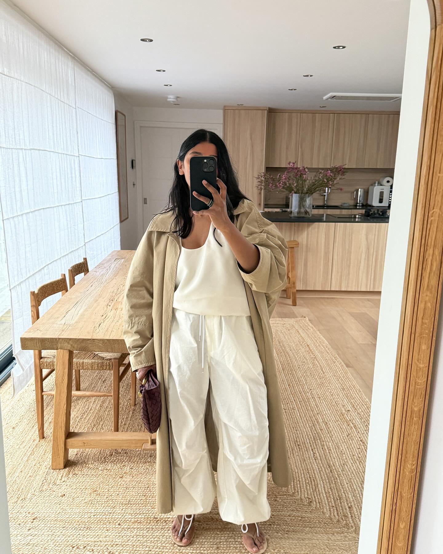 An image of @monikh wearing an all-white outfit for women.