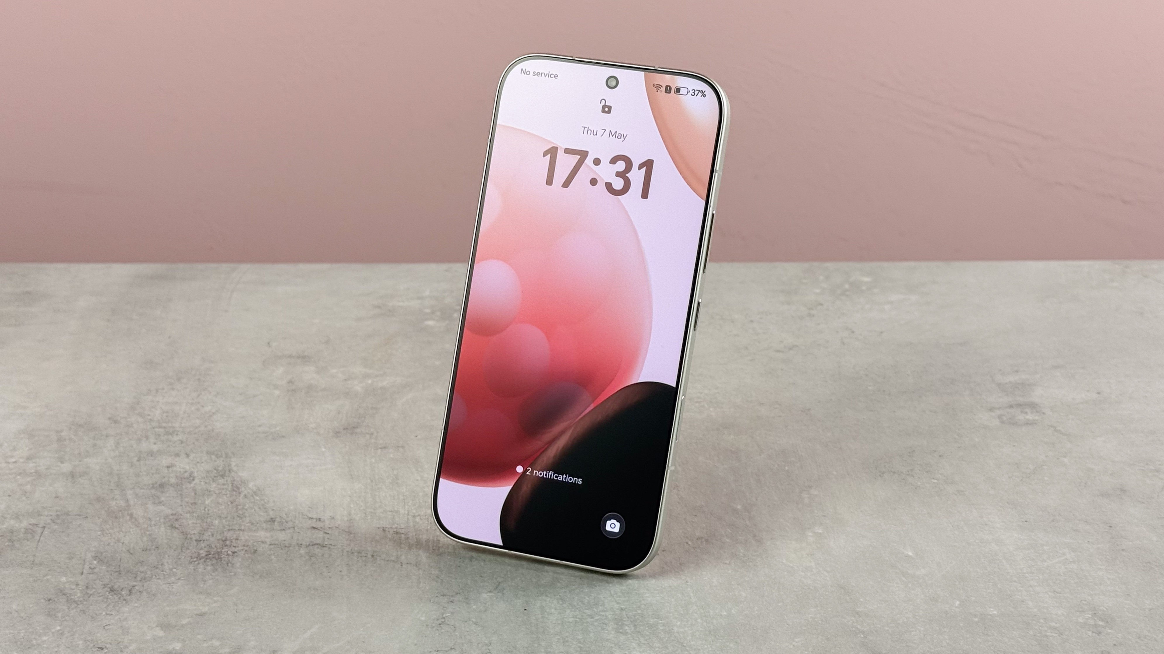 The Honor 600 at a slight angle showing the lock screen.