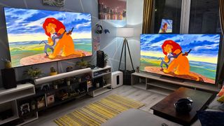 The Lion King is shown on two LG TVs in one room