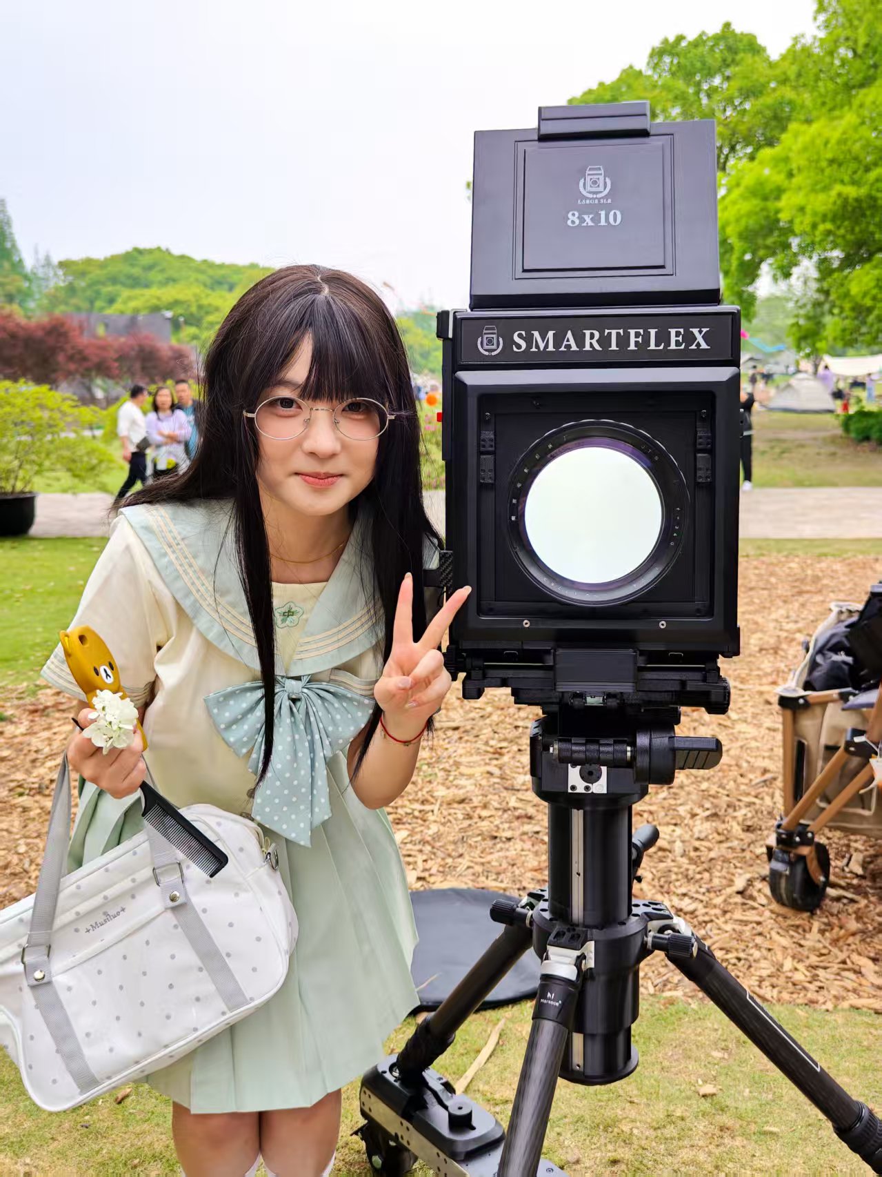 The Smartflex 8x10 SLR is a large-format film camera with a viewfinder and SLR design