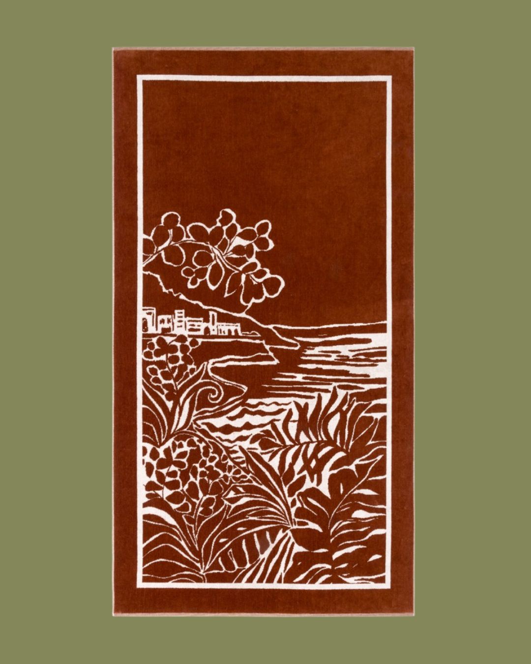 A coastal view imprinted on a terracotta and white beach towel, placed against a dark green background.