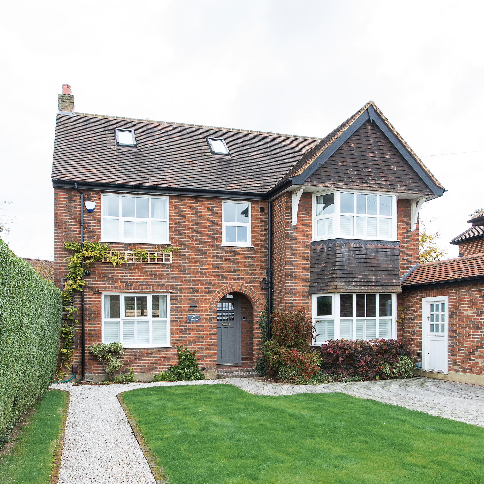 Brick house exterior with lawn