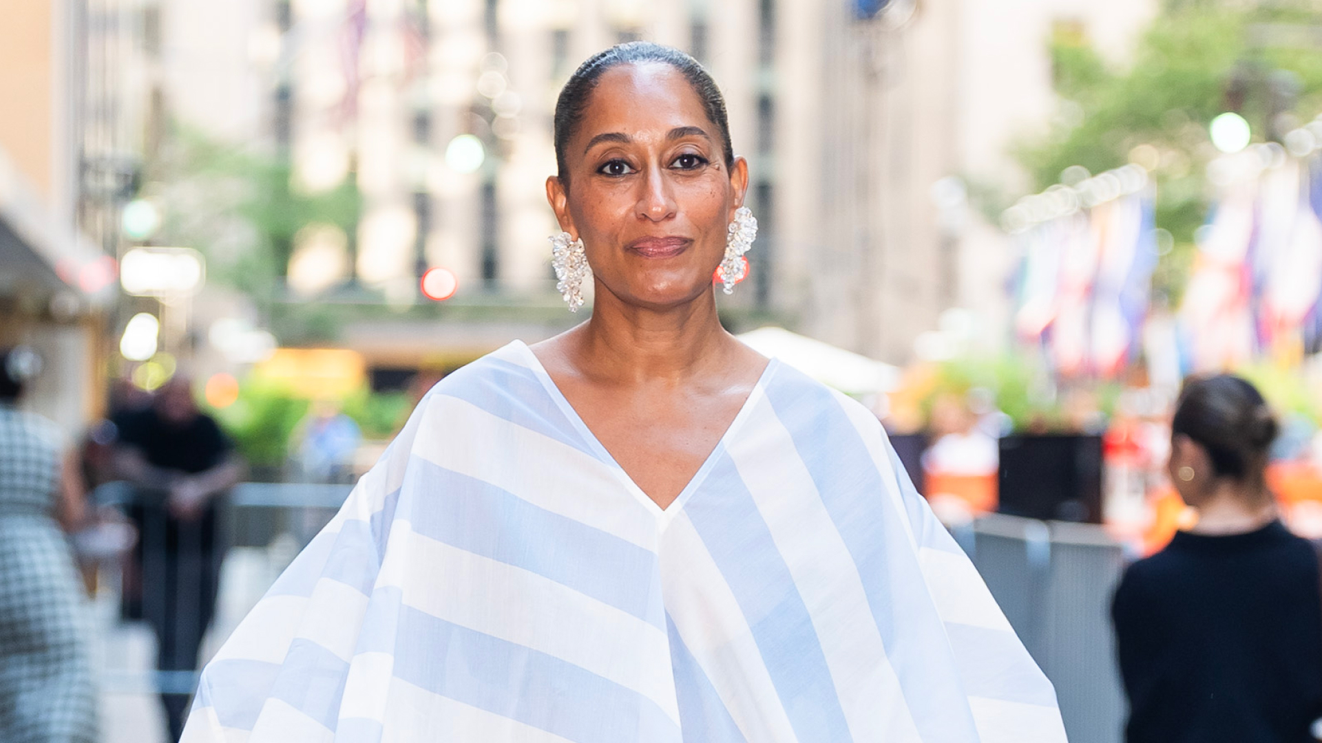 Tracee Ellis Ross wearing a slicked-back bun.