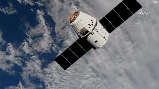 SpaceX's Dragon cargo capsule approaches the International Space Station on March 9, 2020.