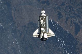 Astronaut Ron Garan, aboard the International Space Station, tweeted (as @Astro_Ron): "Our house guests have arrived! Space Shuttle Endeavour on approach over the Rhine River earlier today #FromSpace." Endeavour docked with the ISS on May 18, 2011 (Flight