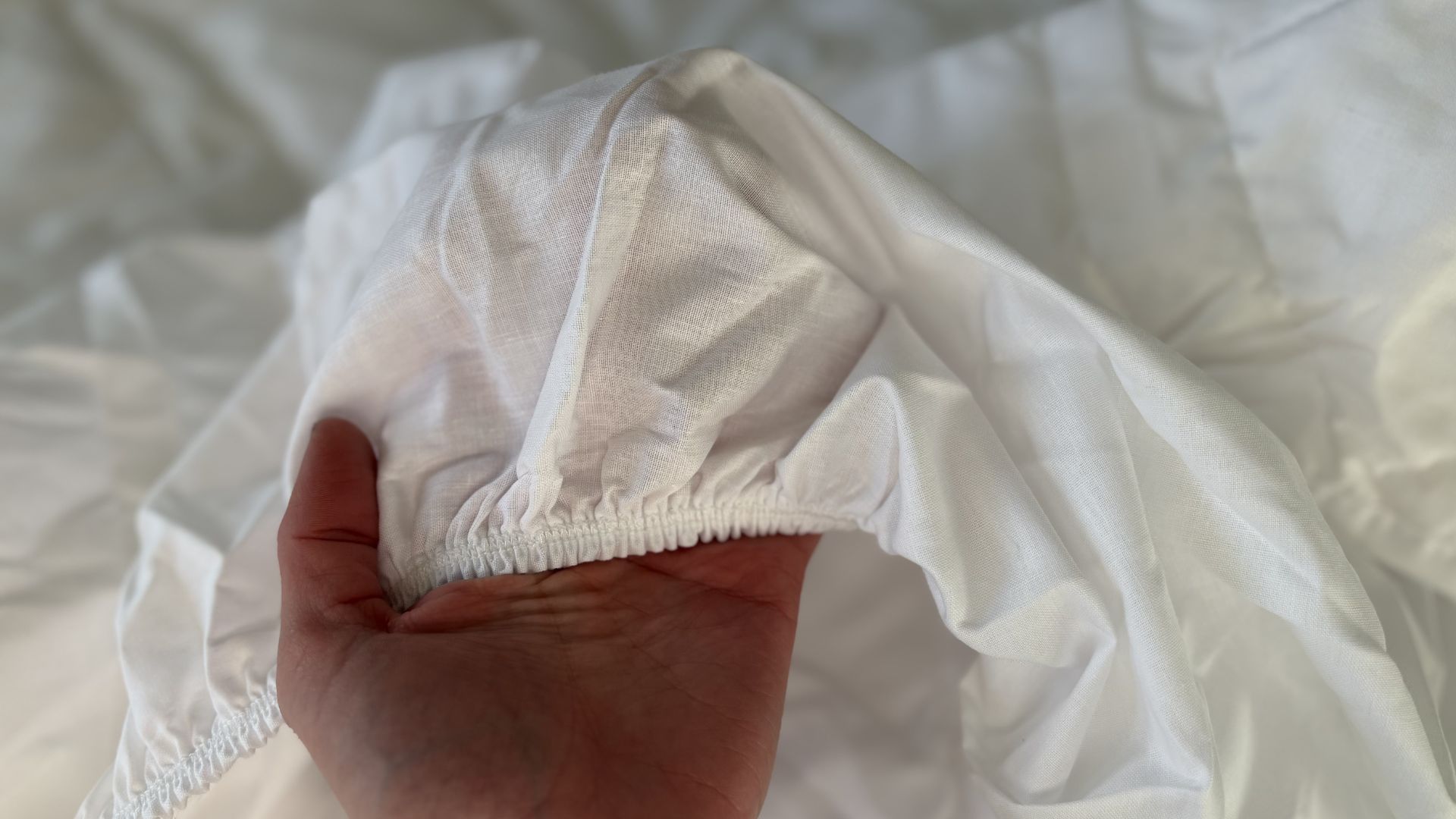 Simba Performance Mattress Protector being tested, on the bed