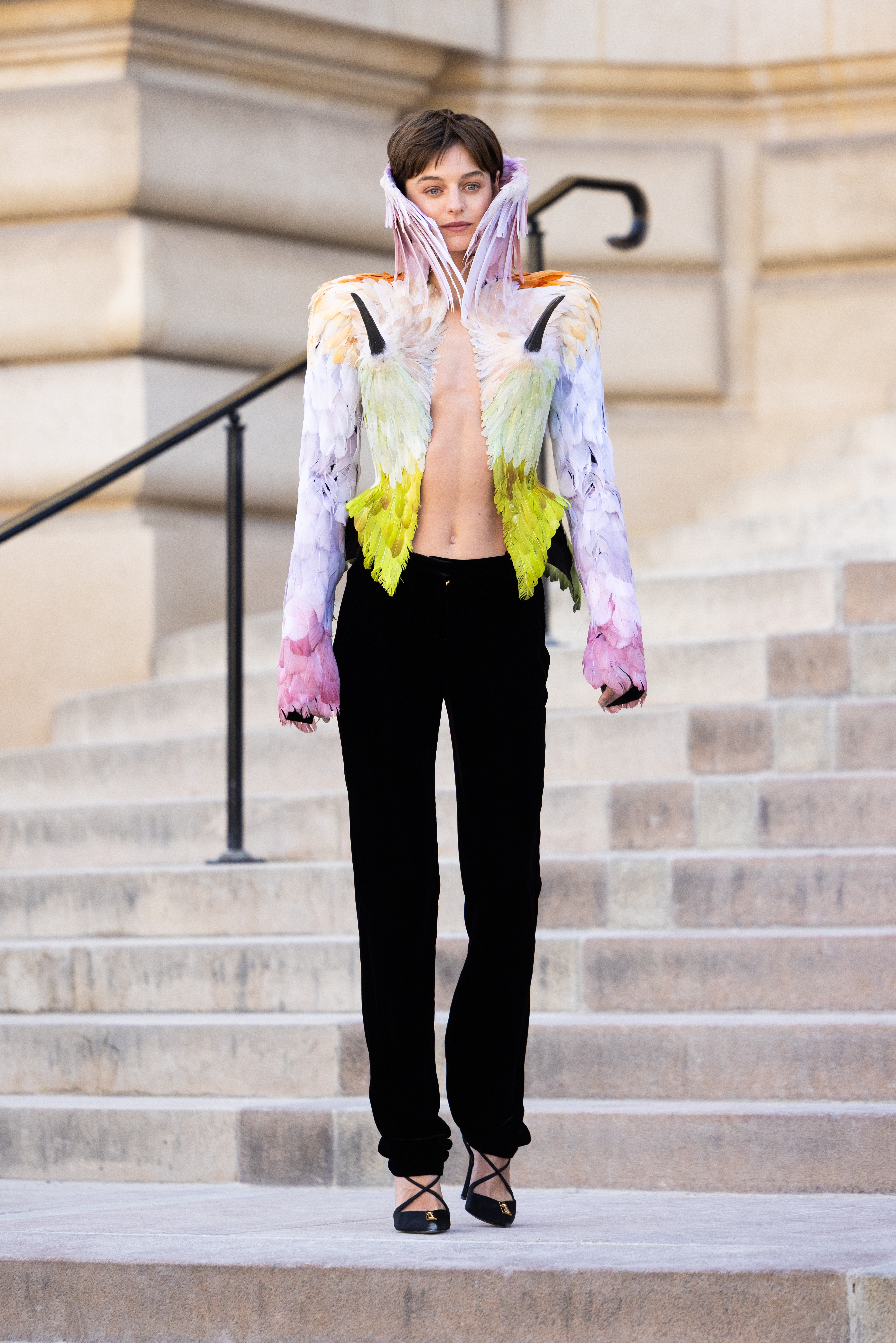 An image of Emma Corrin at the Schiaparelli Haute Couture FW26 show.