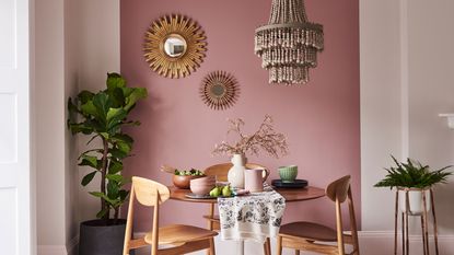 pink wall in dining area