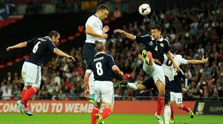 Rickie Lambert scores on his England debut against Scotland