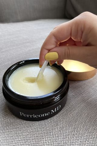 valeza using one of the best cleansing balms in this list