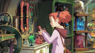 A girl stands in the centers of a room filled with magical trinkets