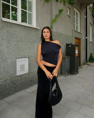 @isabellecoheen wearing a column skirt and off-shoulder top