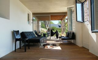 Living room interior and cow patch rug