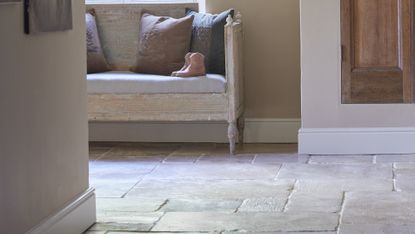 How to repair stone floors: this shows an old limestone floor