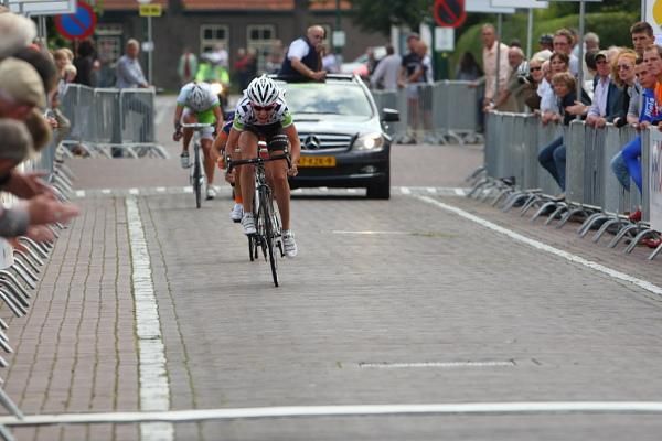 Winning from the front, Martine Bras (Merida-Gauss) accelerates towards the finish line ahead of Valentina Bastianelli (Top Girls Fassa Bortolo - Ghezzi) and Janneke Ensing (Dolmans Landscaping)