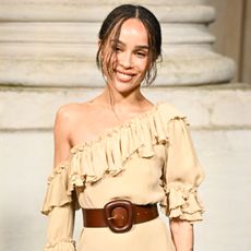 PARIS, FRANCE - JANUARY 28: (EDITORIAL USE ONLY - For Non-Editorial use please seek approval from Fashion House and if La Bourse de Commerce appears on the image please credit Â© Tadao Ando Architect & Associates, Niney et Marca Architectes, agence Pierre-Antoine Gatier) Zoe Kravitz attends the Saint Laurent Menswear Fall-Winter 2025/2026 show as part of Paris Fashion Week at La Bourse de Commerce - Pinault Collection on January 28, 2025 in Paris, France. (Photo by Stephane Cardinale - Corbis/Corbis via Getty Images)