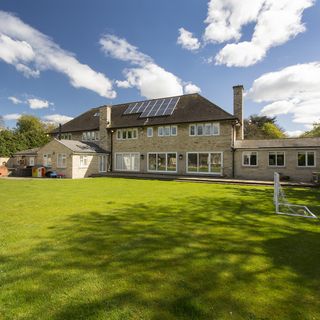 villa with garden lawn