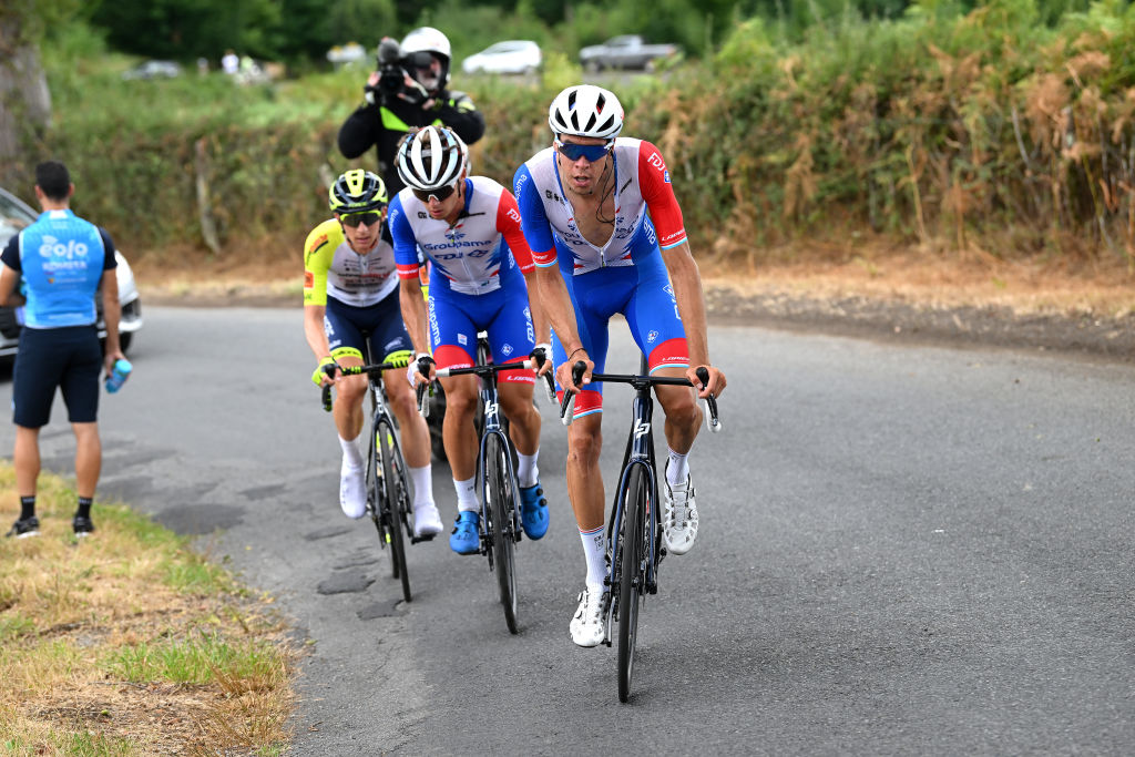 LIMOGES FRANCE AUGUST 18 LR Dimitri Claeys of Belgium and Team Intermarch Wanty Gobert Matriaux Valentin Madouas of France and Kevin Geniets of Luxembourg and Team Groupama FDJ compete in the breakaway during the 55th Tour du Limousin Nouvelle Aquitaine 2022 Stage 3 a 1817km stage from Donzenac to Malemort TDL2022 on August 18 2022 in Limoges France Photo by Dario BelingheriGetty Images