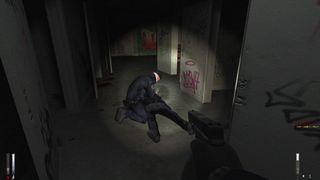 Best Free Steam games - Cry Of Fear - A character in black tactical gear kneels over a prone other character.