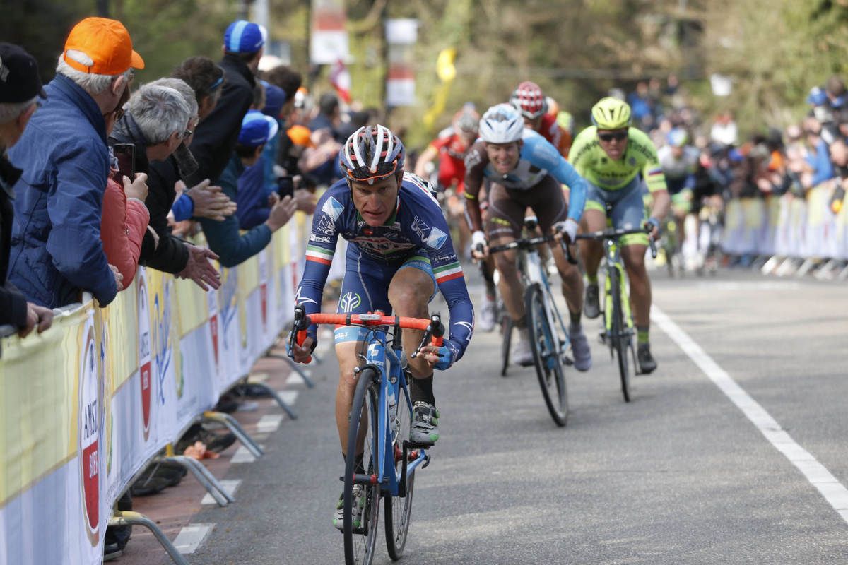 Enrico Gasparotto drops it into the small ring up the Cauberg