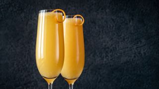 Bucks fizz with kombucha in flute glass